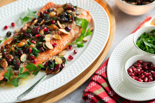 Holiday inspired Baked Salmon with cranberries, almonds, pomegranate