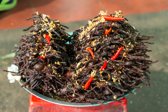 Fried Tarantula spiders with chillis for sale as snacks at Skun Market near Siem Reap, Cambodia