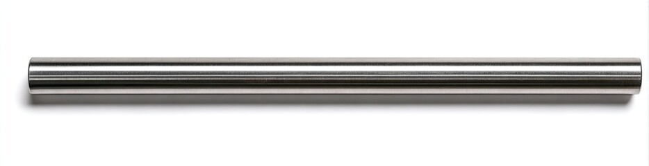 A long, cylindrical, shiny, metallic rod lies horizontally on a white background