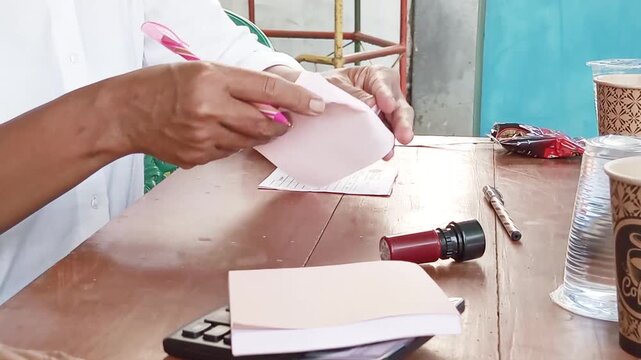 Manually in micro business transactions, checking the income and expenditure notes for each transaction needs to be recorded to monitor financial conditions and ensure data transparency.
