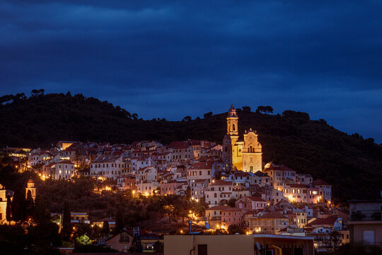 The beautiful fishermen village of Cervo in Liguria, The italian Riviera top hill with its prominent Church of Saint John, also known as "corallini".