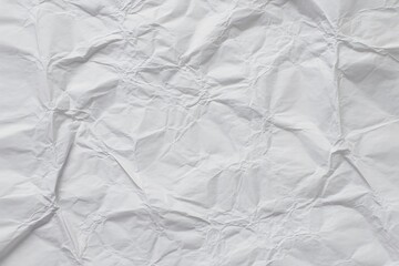 Fototapeta premium White Crumpled Paper Texture Close-up with Soft Shadows - Stock Media