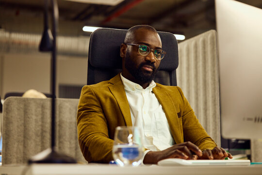 Man focused on work at his computer