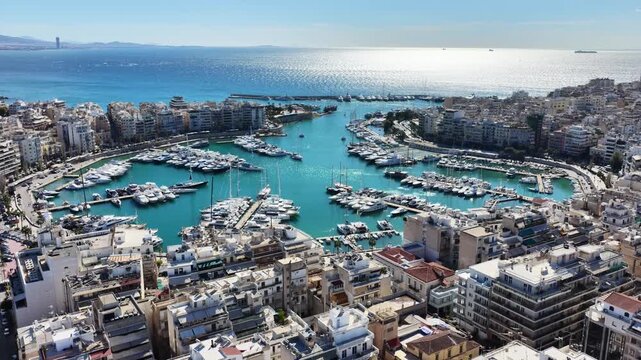 Aerial drone cinematic video of famous port and Marina of Zea or Pasalimani in the heart of Piraeus, Attica, Greece