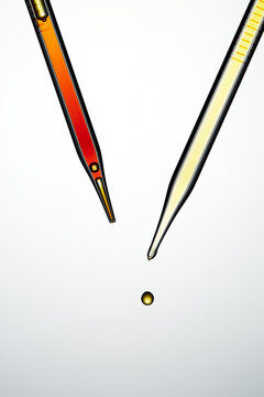 Colored pipettes with liquid