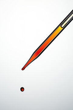 pipette with red liquid