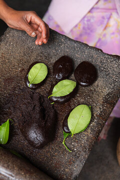 Close-Up of chocolate wrapped with lime leaves
