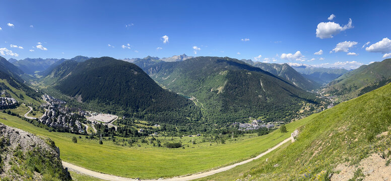 Scenic Pyrenees valley panorama with village and mountains