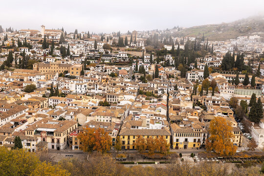 Granada cityscape with white houses on a cloudy day