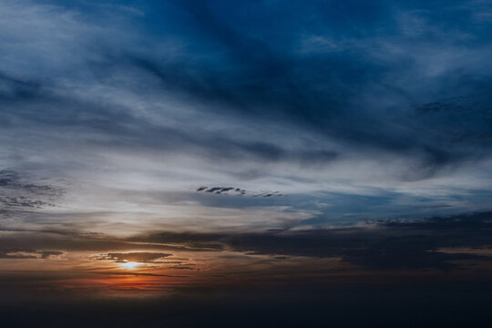 Serene twilight sky with dramatic cloud patterns