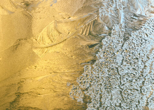 Textures Formed by Frost on a Glass Surface in Winter