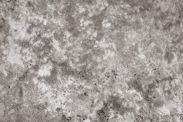 Fototapeta premium Grey natural stone texture close-up. Raw concrete or dark granite surface with rough mineral pattern