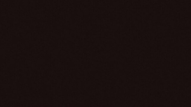 A dark background scattered with small, colorful dots resembling distant stars