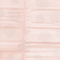 Peach seamless floral pattern with subtle mandala shapes and crumpled paper texture. Vintage pastel background perfect for scrapbooking and creative layouts.