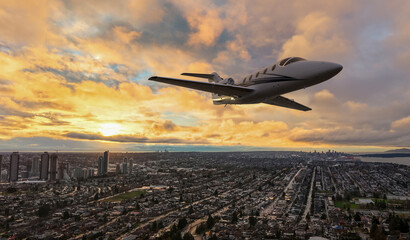 Private Jet Over Sunset Cityscape: Luxurious Travel Amid Golden Sky Above Urban Landscape
