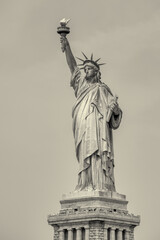 Fototapeta premium Iconic Statue of Liberty photographed from ferry boat in New York City harbor