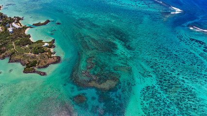Scenic aerial drone photography of the island of Mauritius coast. Beautiful lagoon of the island of Mauritius, taken from above .Indian ocean coral reef © Rechitan Sorin