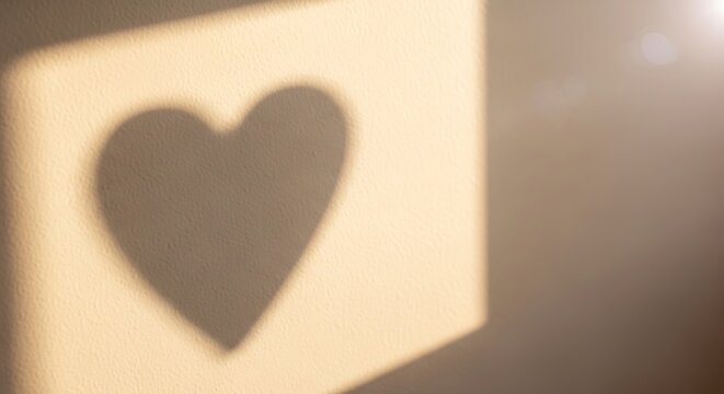 Heart Shadow on Wall, Soft Focus, Warm Lighting, Romantic Background