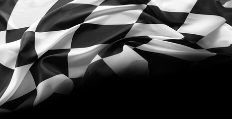 Checkered race flag on black