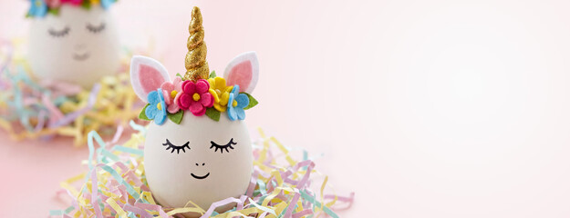 Festive Easter Unicorn Egg with Colorful Flowers and Glitter Horn