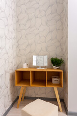 Minimal dressing room interior with open clothing rack