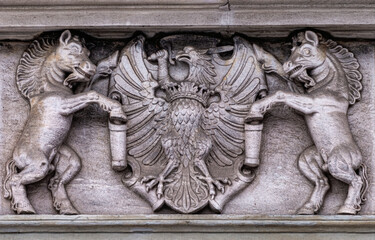 Obraz premium Medieval stone panel with unicorns and royal coat of arms 