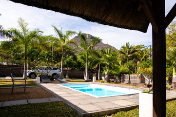 Luxury villa garden with private pool and view of Mount Rempart in Tamarin, Mauritius