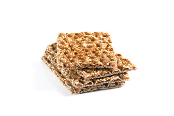 Rye crackers isolated on white background, shallow focus