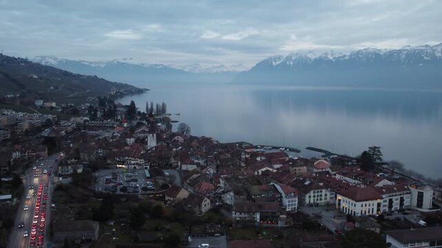 Aerial view of Lutry old town at dusk along Lake Geneva