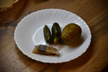 Healthy food clean eating selection: fruit, vegetable, seeds, superfood, cereal, leaf vegetable on gray