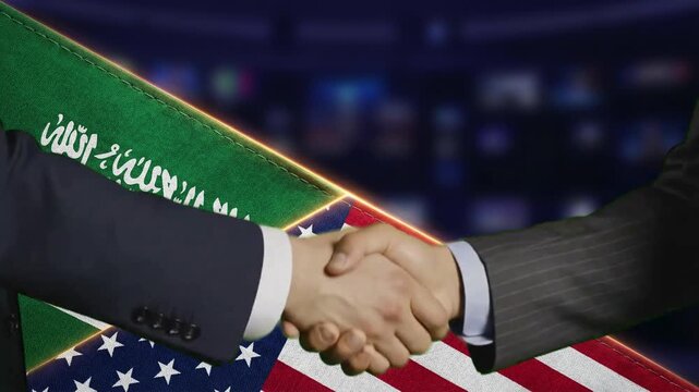 Close-up of a formal business handshake symbolizing diplomatic agreement between Saudi Arabia and the United States of America.