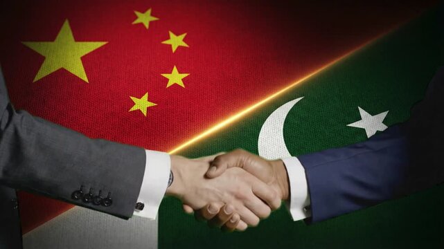 Two businessmen shake hands signifying a formal strategic partnership between the nations of China and Pakistan