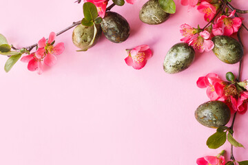 Easter flat lay. Stylish easter eggs and red flowers on pink background. Easter celebration, season greetings mockup. Spring modern floral banner © sonyachny