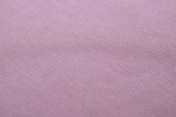 Soft pink fabric texture close up for background, design and textile projects