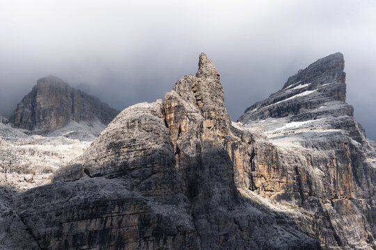 Cima falconer, Castelletto Superiore and Cima Sella mountain peaks, back Scharte Bocca di Tuckett, dramatic atmosphere in the Brenta Mountains, Brenta, Brenta-Adamello Natural Park, Trentino, Italy