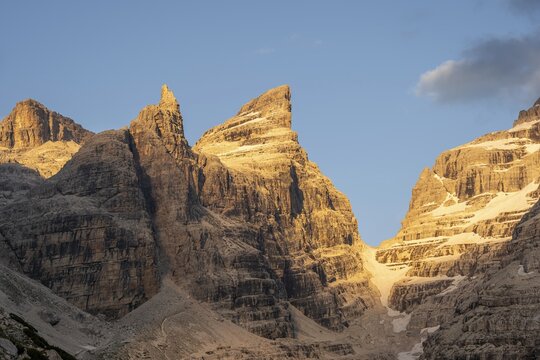 Sunset, mountain valley, Cima falconer mountain peaks, Castelletto Superiore and Cima Sella, behind Scharte Bocca di Tuckett, Brenta Mountains, Brenta, Brenta-Adamello Natural Park, Trentino, Italy