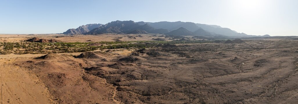 Aerial view, desert landscape on the Ugab River, behind Brandberg, Erongo, Damaraland, Namibia