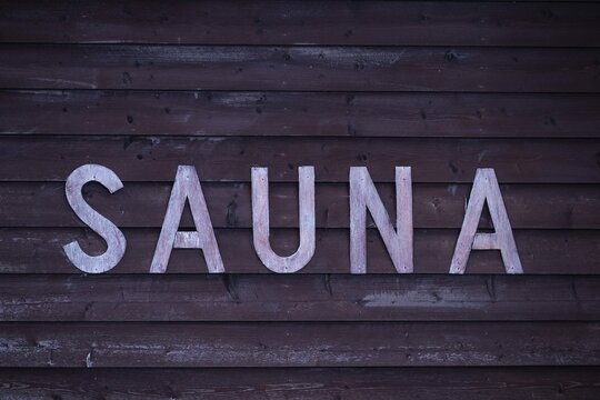 Rustic wooden wall sign with the inscription 'Sauna', Korpostr&ouml;m, Korpo or Korppo, Southwestern Archipelago, Finland