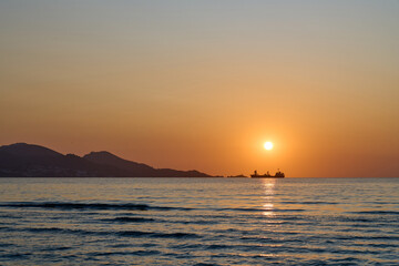 Obraz premium Incredible sunrise over Playa de Alcudia, Bay of Alcudia, Balearic Islands, Spain.