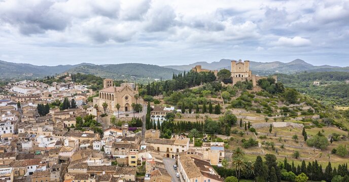 Aerial view, village view Art&aacute; with parish church Transfiguracio del Senyor and monastery Santuari de Sant Salvador at Calvary, Majorca, Balearic Islands, Spain