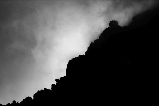 Rock ridge in Bernina group with dramatic clouds, St Moritz, Engadin, Grisons, Switzerland