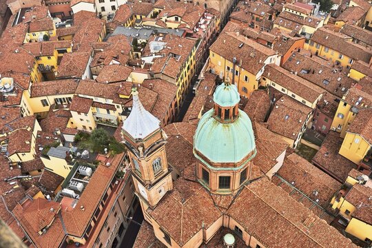 View from the Asinelli Tower of the towers of the churches of Santi Bartolomeo and Gaetano, Old Town, Bologna, Emilia-Romagna, Italy