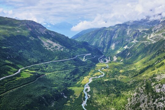View from the Rhone glacier of the glacial stream and the pass roads, Furka on the left and Grimsel on the right, Gletsch, Canton Valais, Switzerland