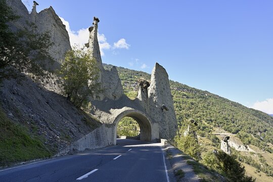 Road tunnel through earth pyramids of Euseigne, Val d'Herens, d'Heremence, Caton Valais, Switzerland