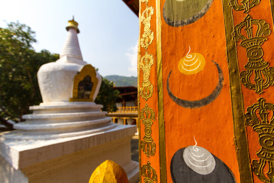 White Buddhist Stupa with Mountain Sky in Bhutan