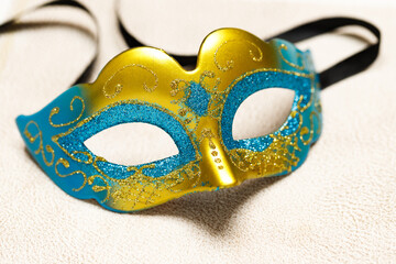 Red and gold mask for celebration carnival. Jewish Purim or Mardi Gras. Space for text. Banner