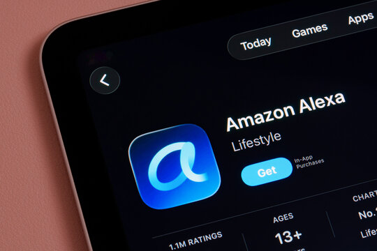 Amazon Alexa app listing in Apple App Store on iPad showing redesigned logo in dark mode and Alexa Plus AI assistant update. Stafford, United Kingdom, February 9, 2026