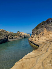 Layered Sandstone Rock Formations in Sidari