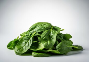 Obraz premium A vibrant pile of fresh, raw spinach leaves harvested for cooking or salad preparation, highlighting healthy eating and organic produce, green, raw, diet