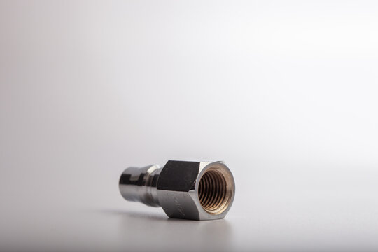 Industrial steel air quick release plug (PM type) with male NPT thread, professional pneumatic nipple for compressor hose connections isolated on white